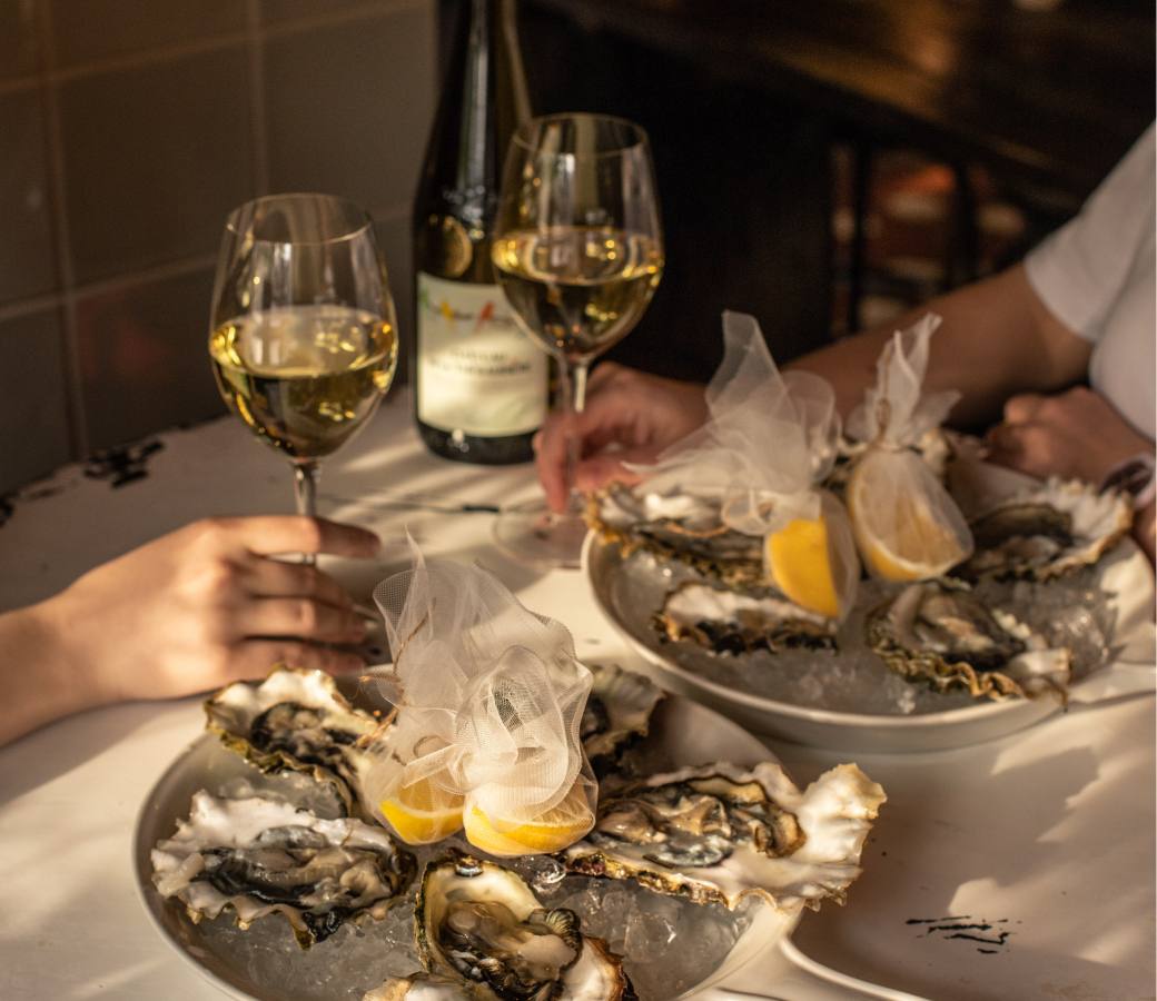 We'll help you with the perfect serve. Oysters, caviar and your wine choices will no longer be intimidating.