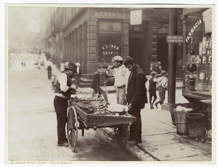 Oyster and clams sellers near Mulberry Bend Park, a public park in New York City, circa 1900s.  New Yorkers of all socioeconomic classes are eating oysters, and lots of them